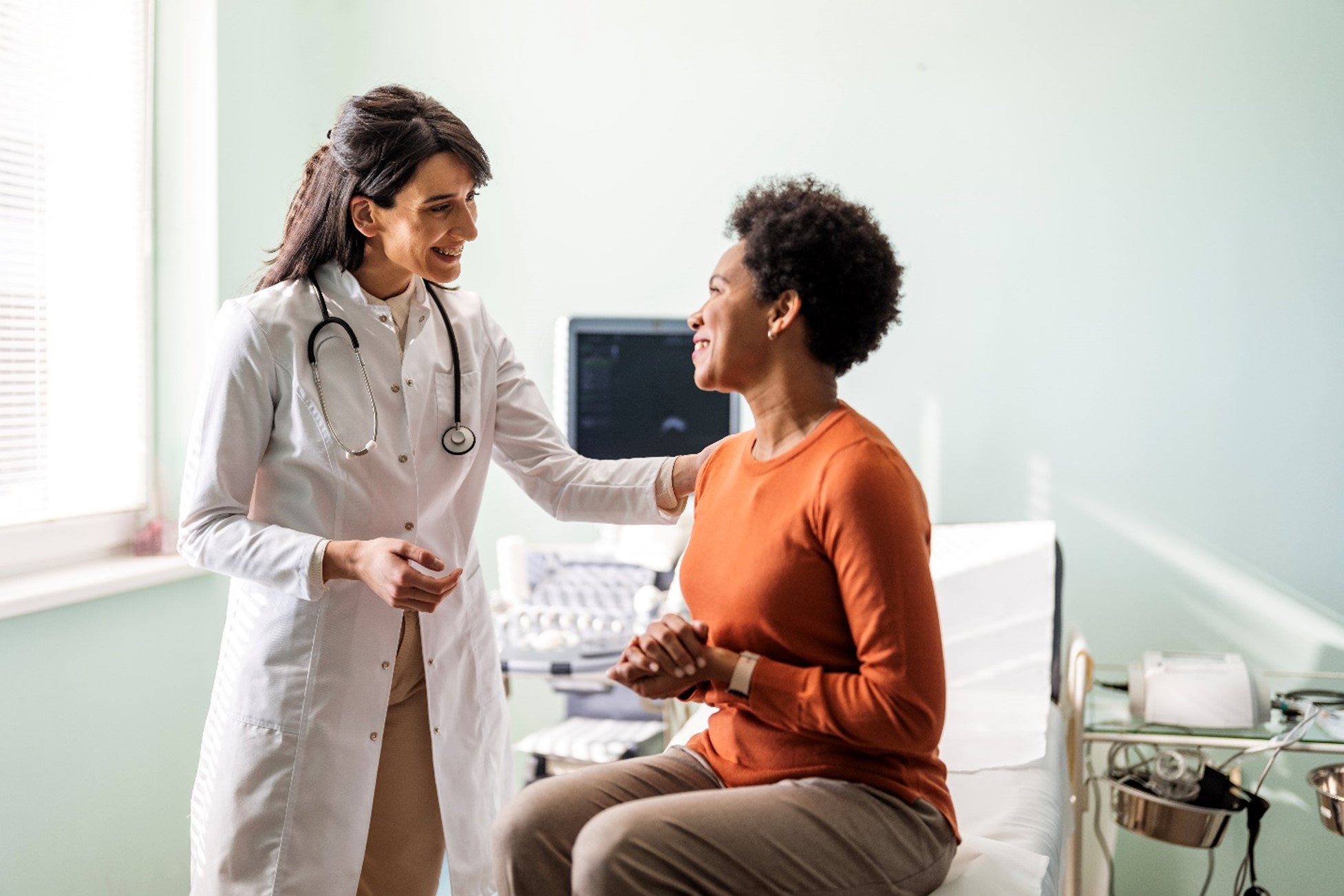 Doctor providing women’s health care during a medical consultation