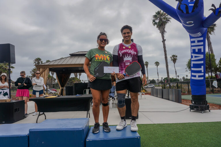 Smiling participants after a game at the OpSam Health event 2025 pickleball in San Diego, CA