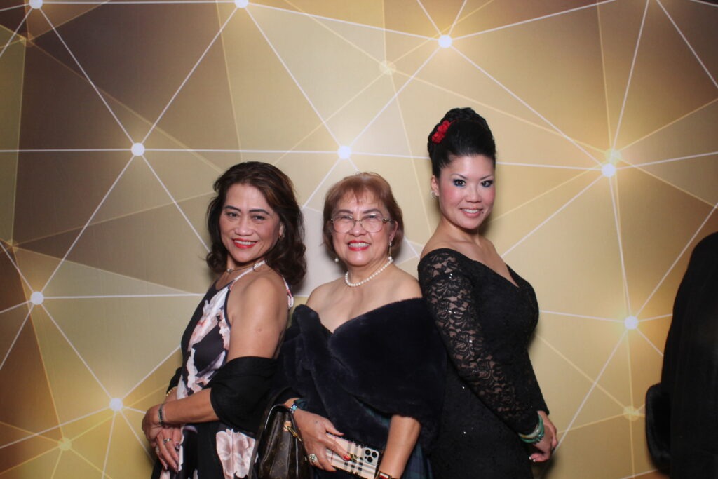 Three women pose for a picture at Gala 2023 in California