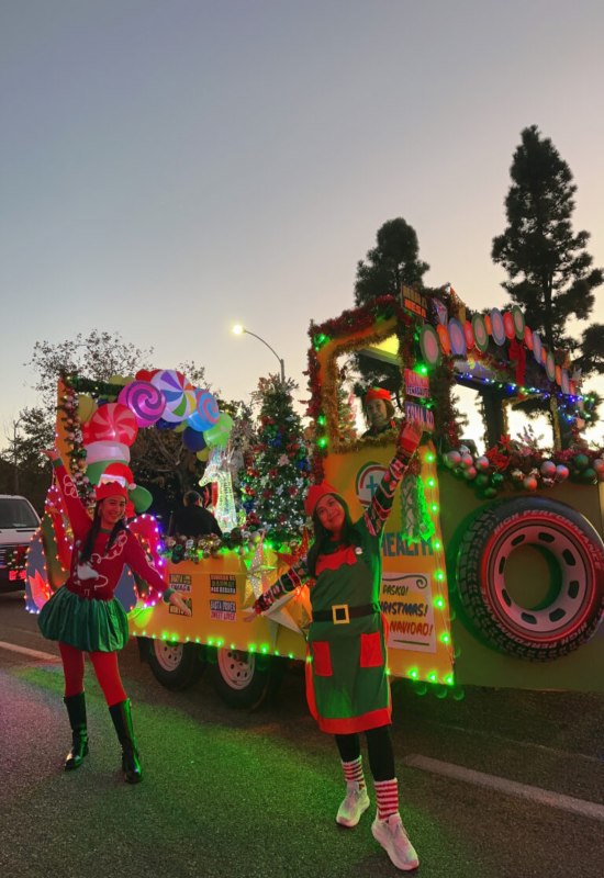 Festive holiday float decorated with lights at the Chula Vista Starlight Parade in San Diego, CA