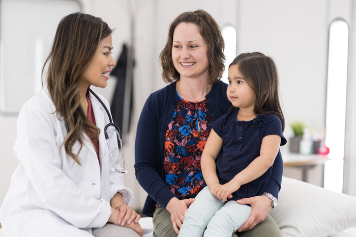 Family consulting with healthcare provider during same day primary care visit in San Diego, CA