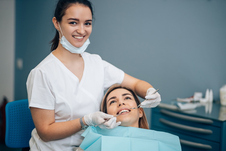 Dental professional providing general dentistry treatment at a clinic in San Diego, CA